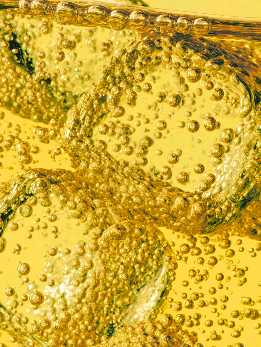 Golden Pineapple Vibed THC seltzer over ice