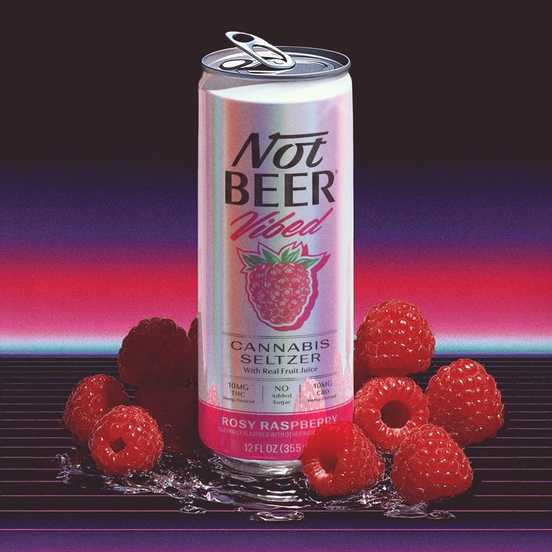 Person relaxing with a Vibed seltzer